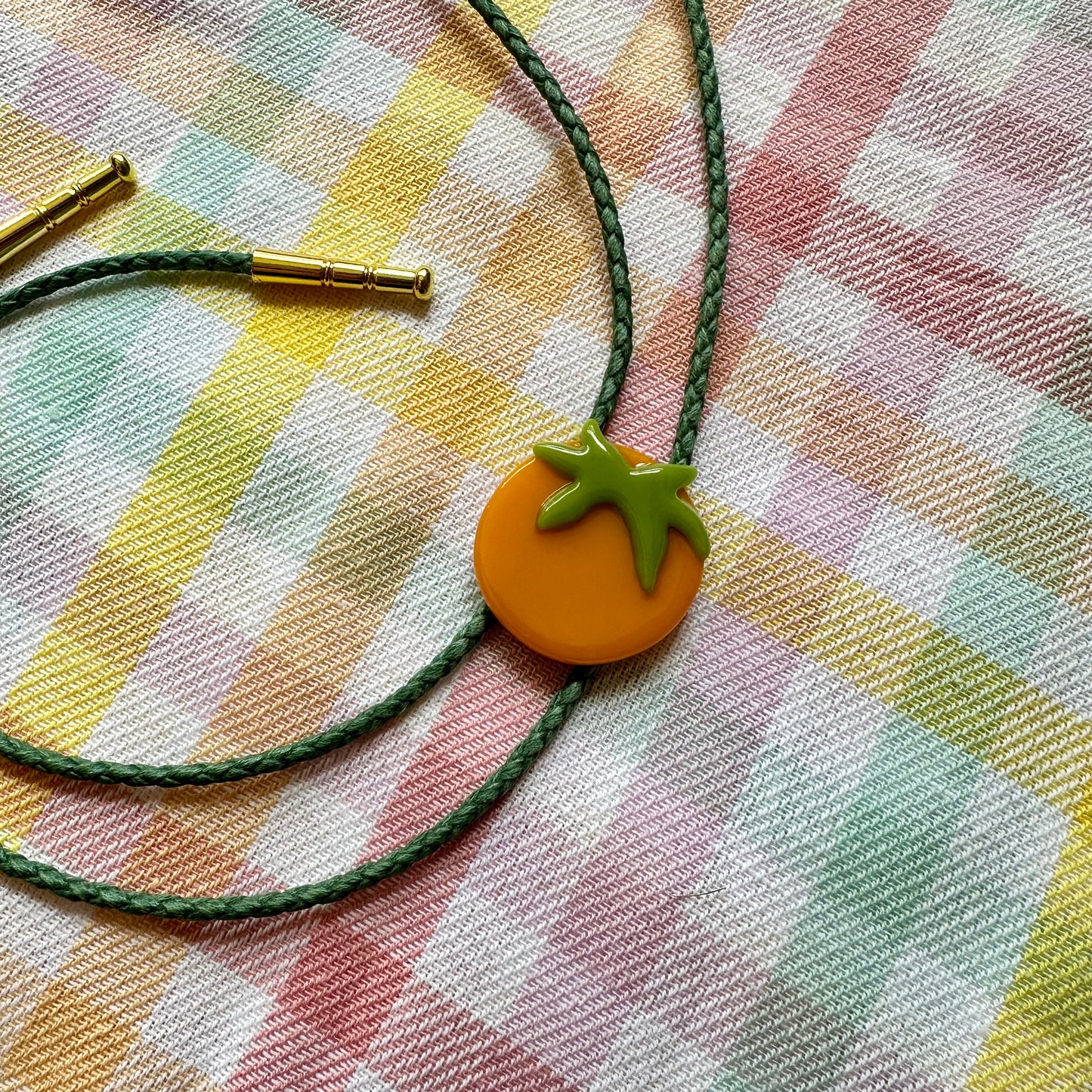 Yellow Tomato Bolo Tie w/ Green Cord A