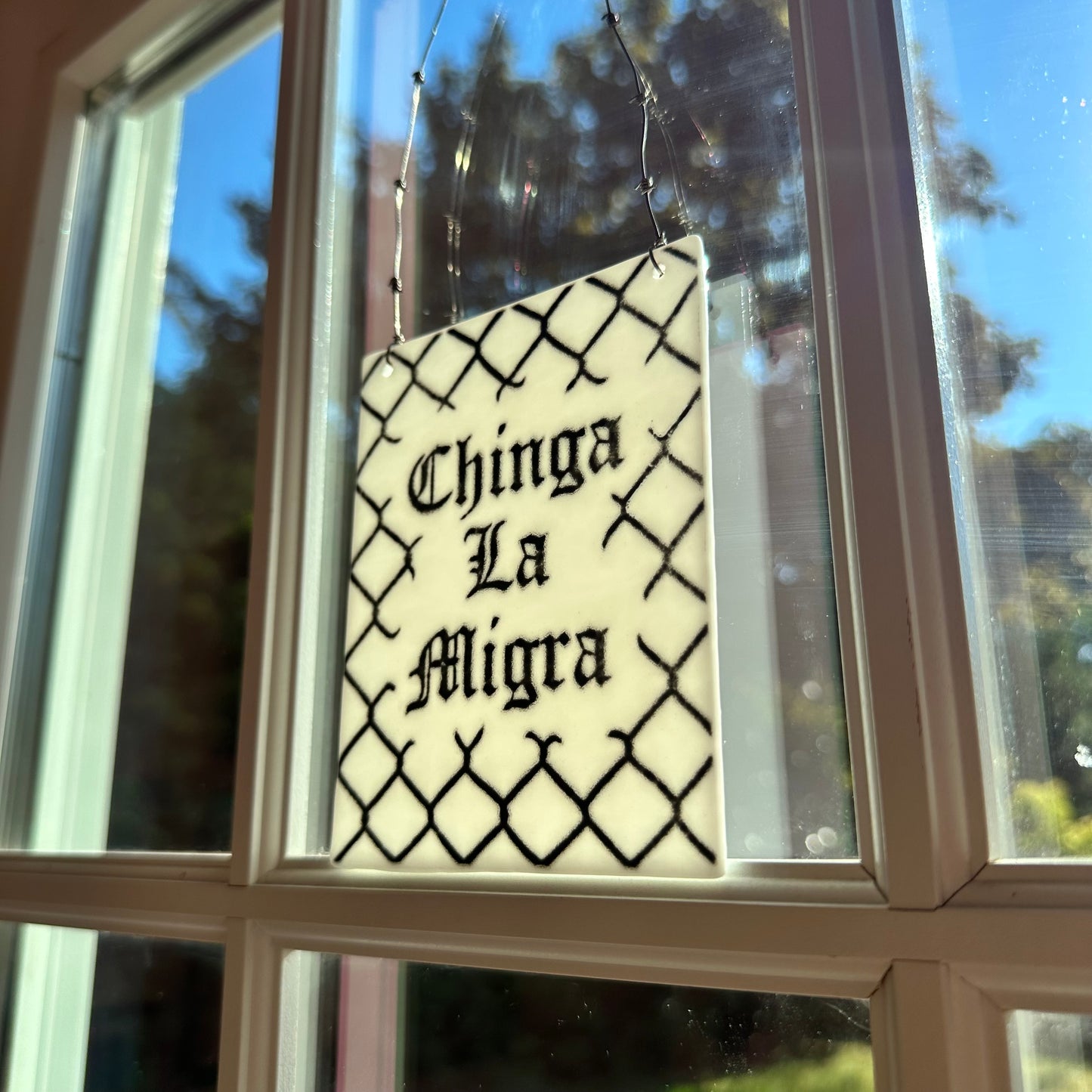 White & Black (A) Chinga La Migra Sun Catcher